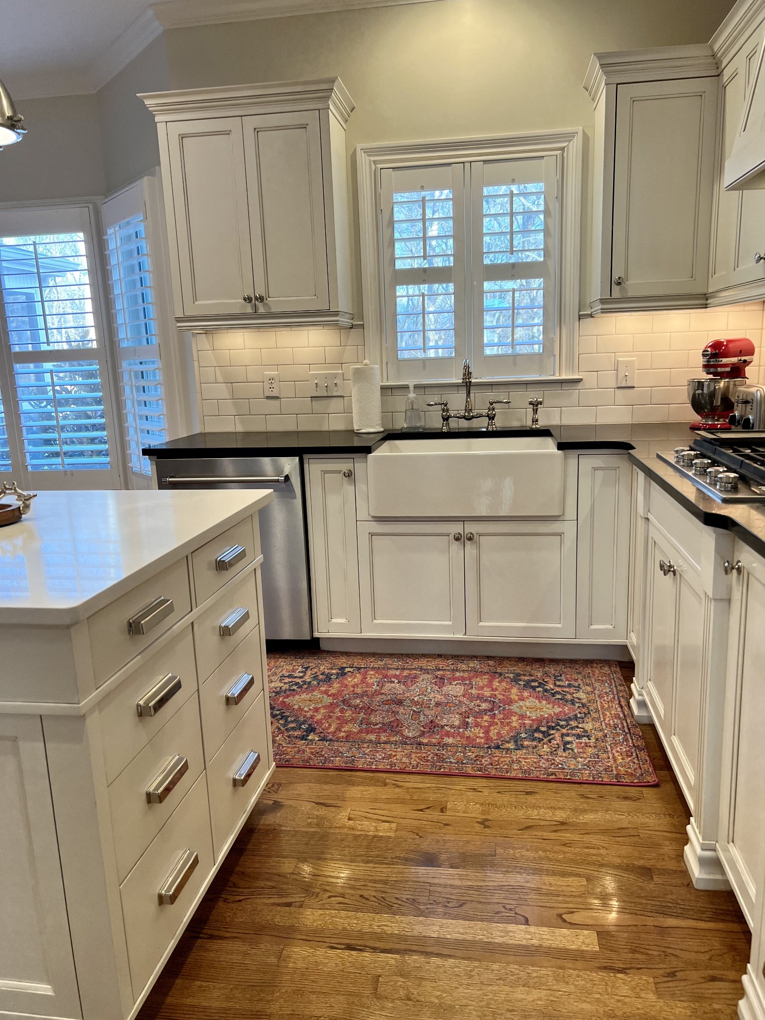 4264 Warren Road Franklin, TN 37067 - Photo 9 of 49 a kitchen with granite countertop a sink a stove and cabinets