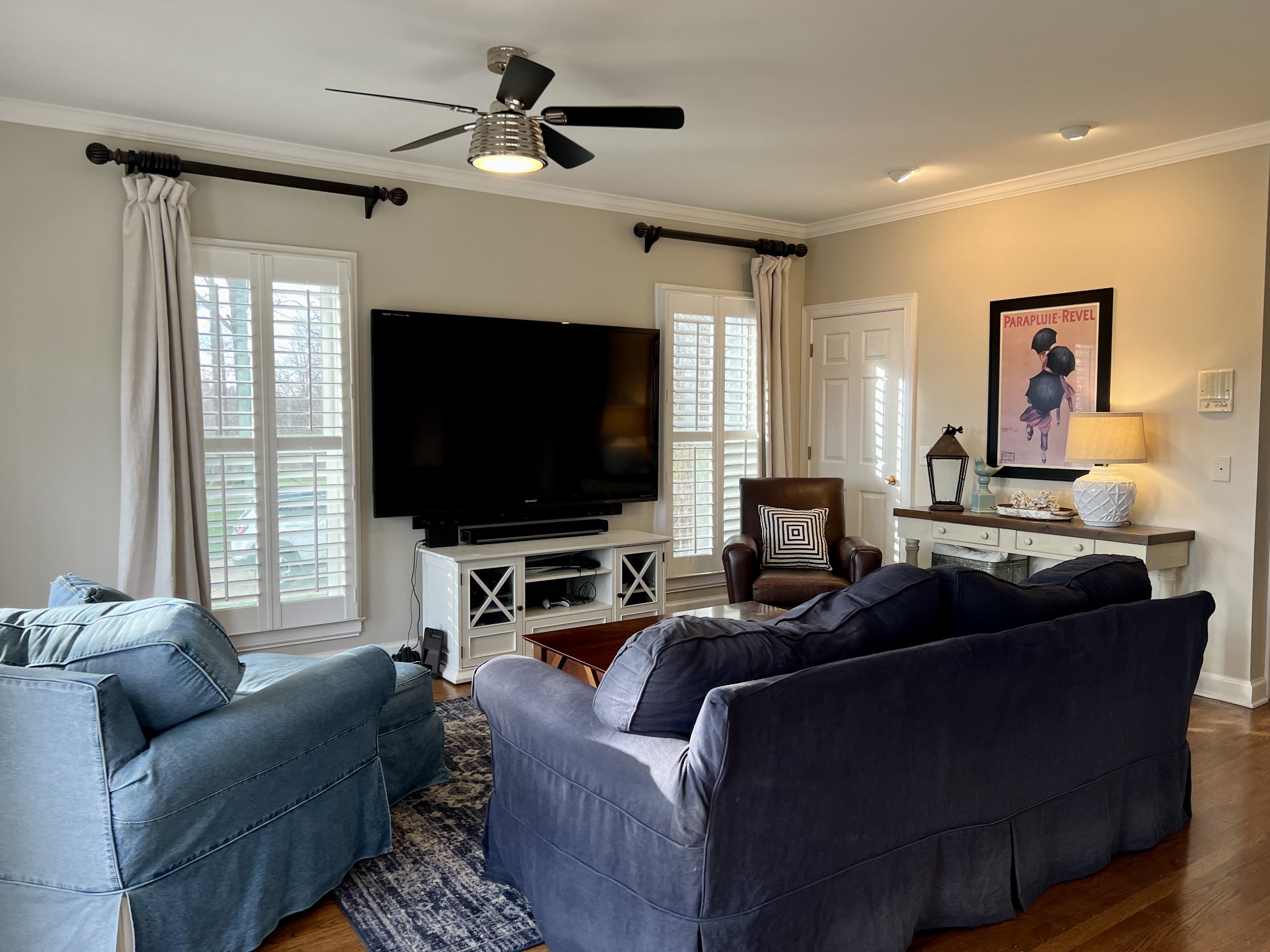 4264 Warren Road Franklin, TN 37067 - Photo 10 of 49 a living room with furniture and a flat screen tv