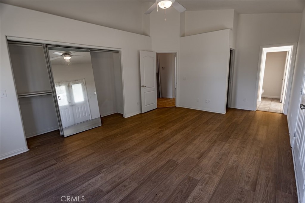 12384 Redwood Road Pinon Hills, CA 92372 - Photo 15 of 35 a view of empty room with wooden floor