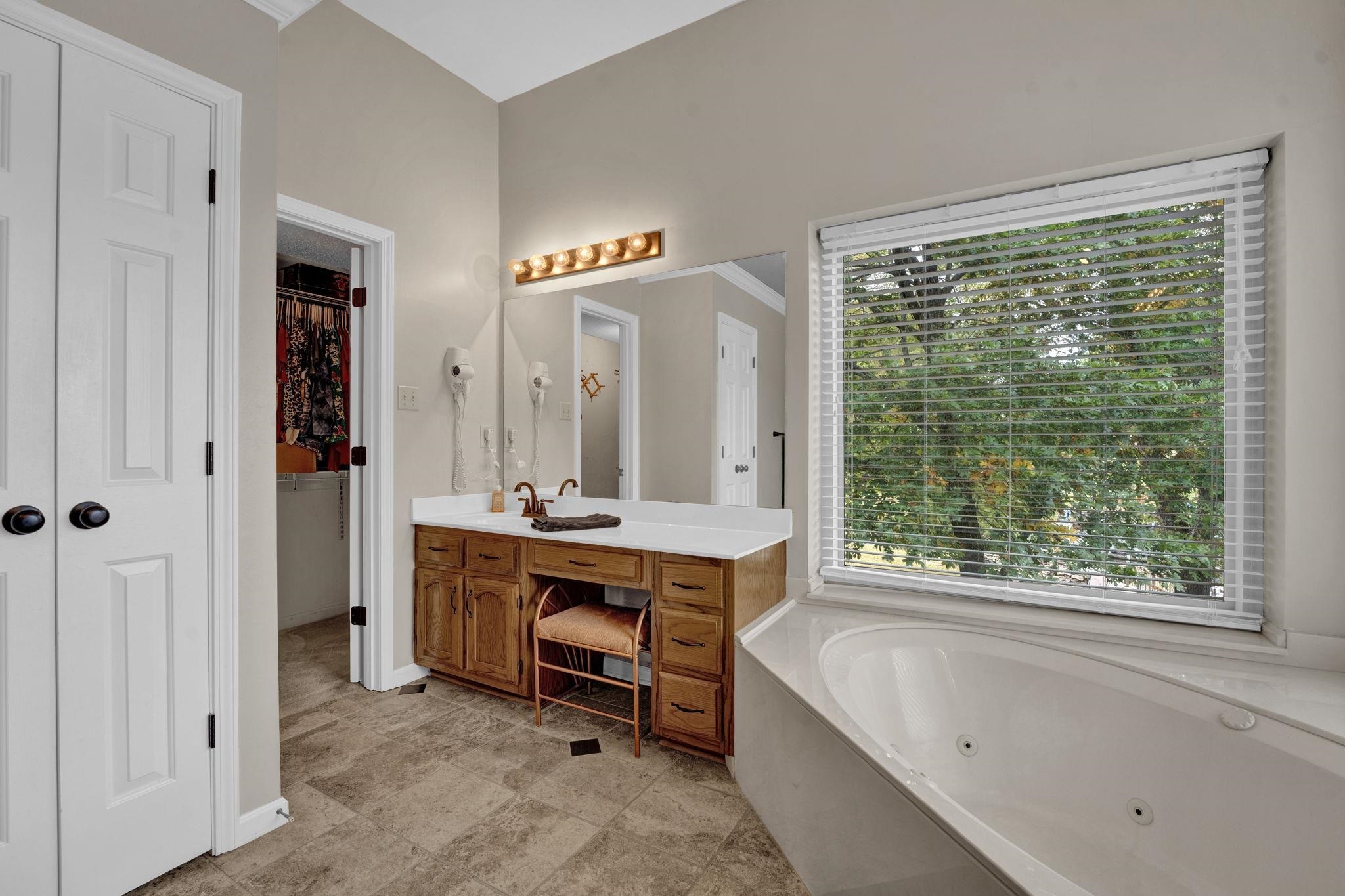 4077 Cedar Point Road Lakeland, TN 38002 - Photo 14 of 25 a view of bathroom with dual sinks