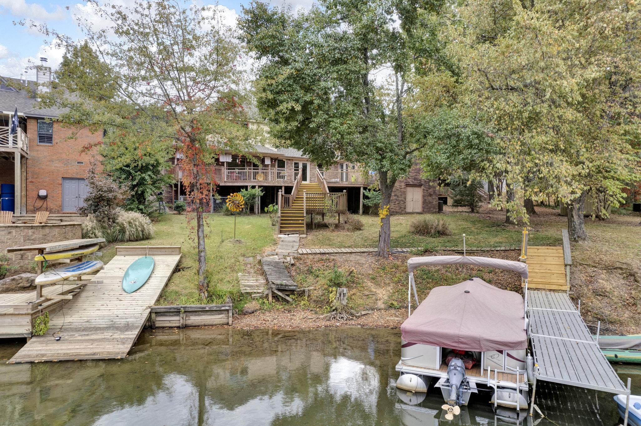4077 Cedar Point Road Lakeland, TN 38002 - Photo 19 of 25 an outdoor space with swimming pool and furniture
