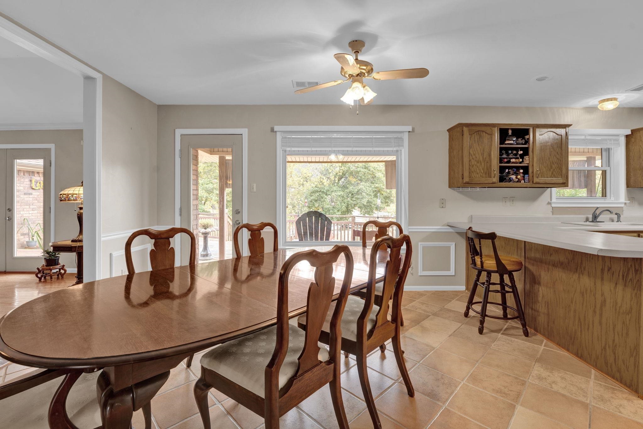 4077 Cedar Point Road Lakeland, TN 38002 - Photo 7 of 25 a dining room with furniture and chandelier