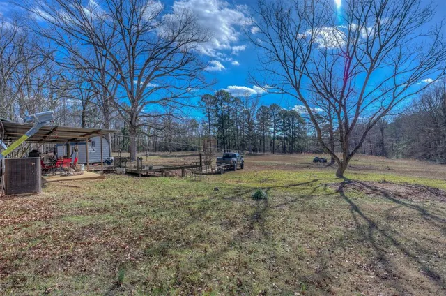a view of backyard with green space