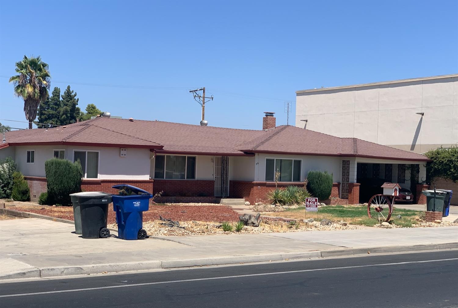 56 West Hanford Armona Road Lemoore, CA 93245 - Photo 1 of 15 a view of a house with sitting area