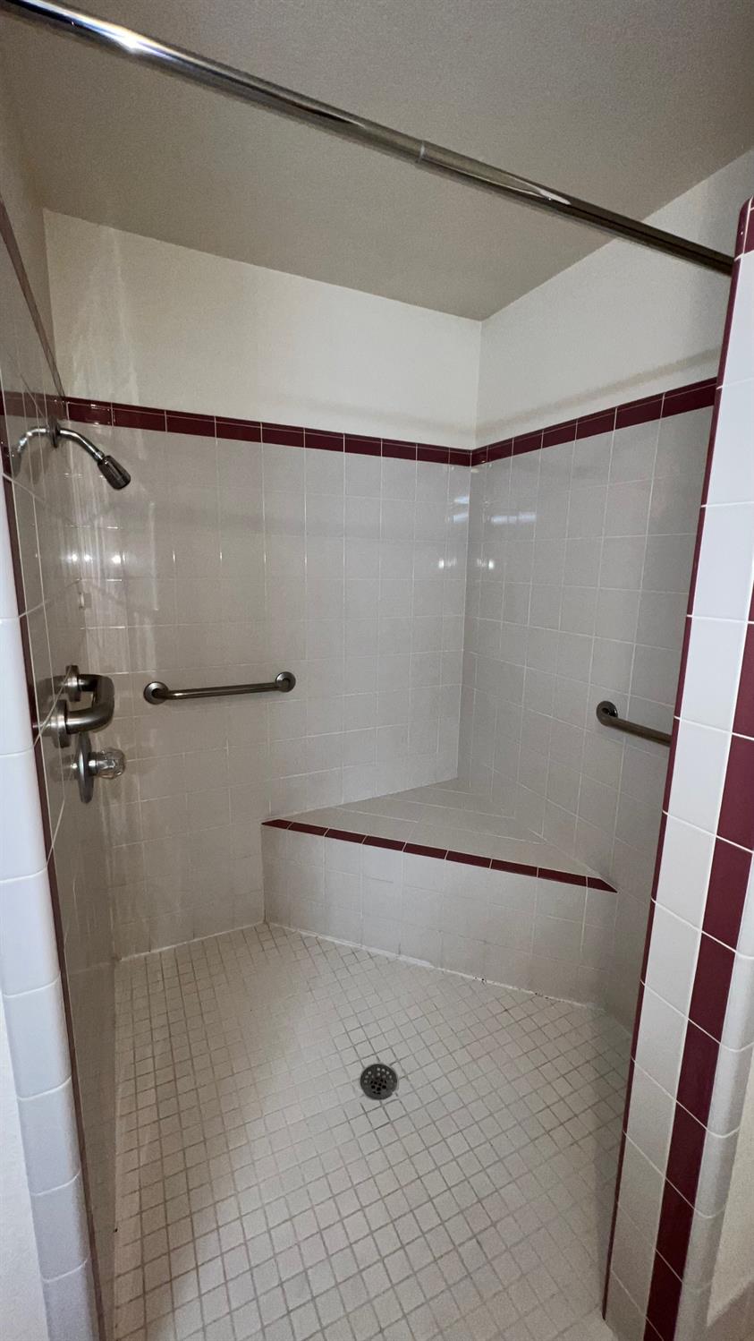 56 West Hanford Armona Road Lemoore, CA 93245 - Photo 11 of 15 a bathroom with a shower