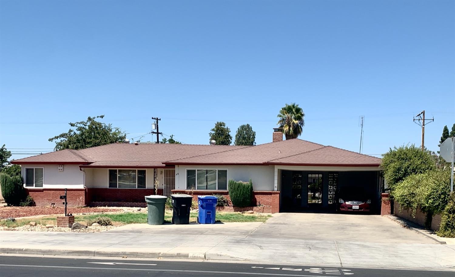 56 West Hanford Armona Road Lemoore, CA 93245 - Photo 5 of 15 a front view of a building with street