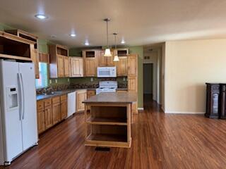 355 Colver Road, Unit 24 Talent, OR 97540 - Photo 9 of 21 a kitchen with stainless steel appliances a refrigerator and a stove top oven
