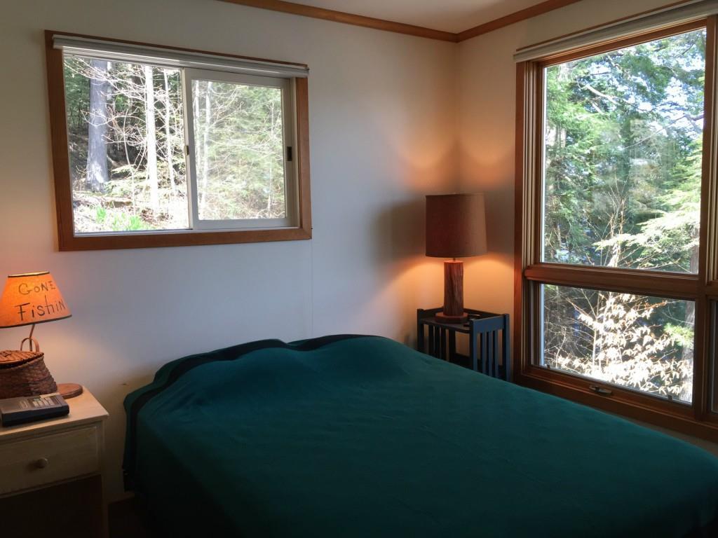 171 Maranacook Shore Road Readfield, ME 04355 - Photo 11 of 27 Master bedroom looks out over the lake.