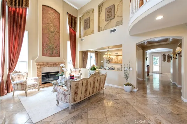 a very nice looking dining room with furniture window and wooden floor
