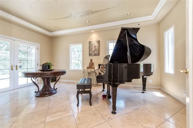 a kitchen with stainless steel appliances granite countertop a stove and a refrigerator