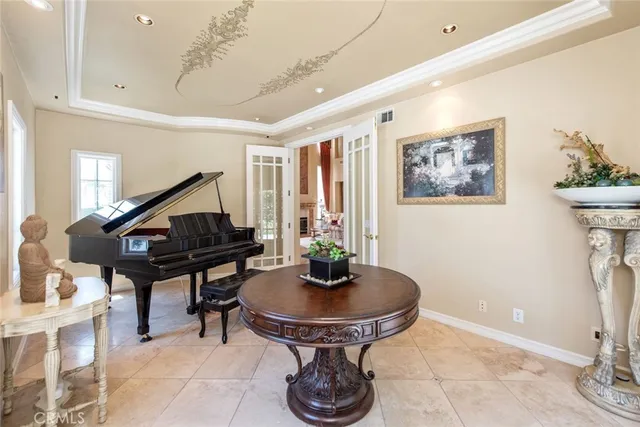 a large kitchen with stainless steel appliances lots of counter space and breakfast area