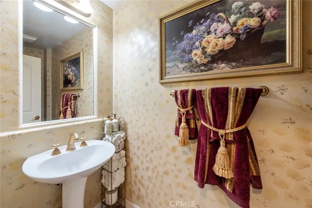 a view of kitchen with kitchen island granite countertop lots of counter top space