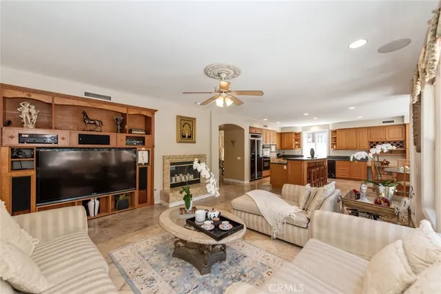 a spacious bedroom with a bed and a large window