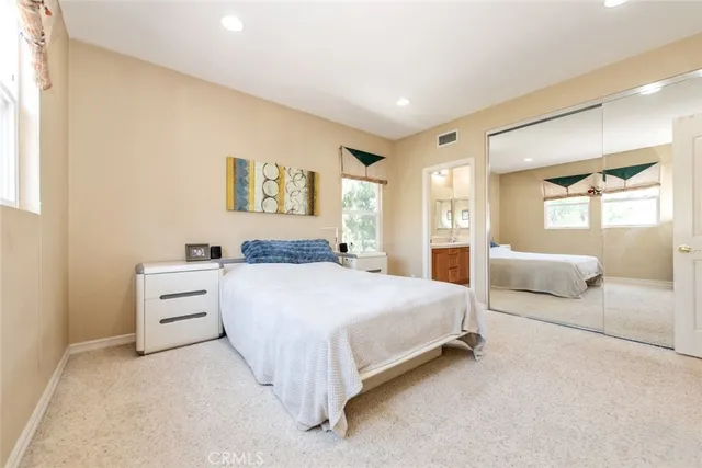 a view of a patio with table and chairs and potted plants
