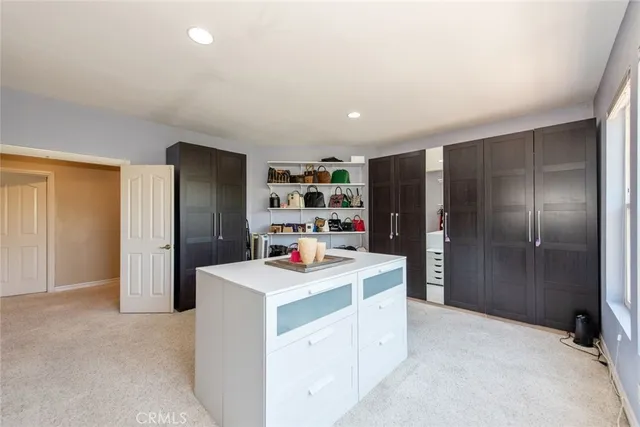 an aerial view of a house yard and swimming pool