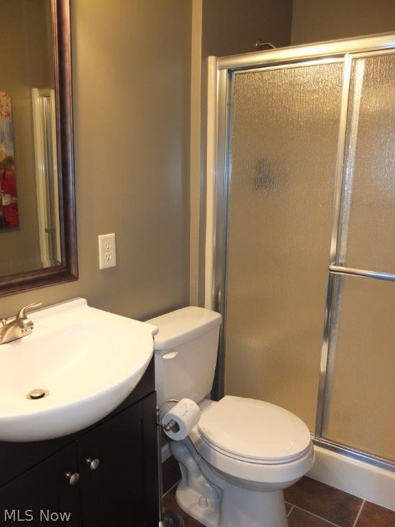 3713 Cottage Grove Road Akron, OH 44319 - Photo 13 of 18 Full bath with new vanity, tile floor and new light fixture in the lower level.