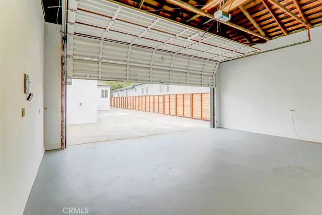 an empty room with white walls