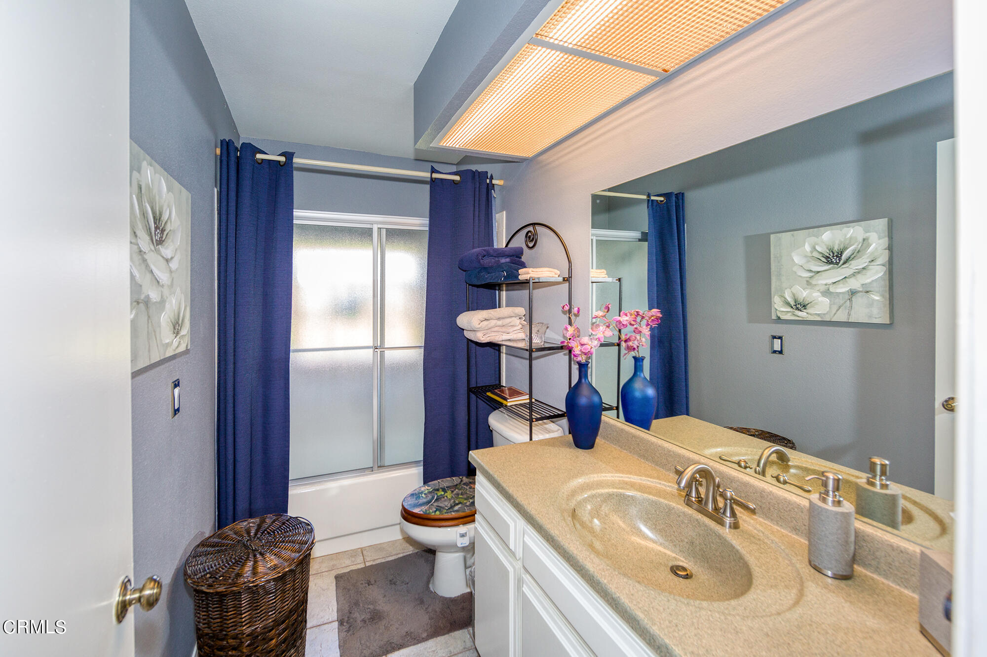777 Sir George Court Moorpark, CA 93021 - Photo 14 of 22 a bathroom with a sink a toilet and shower