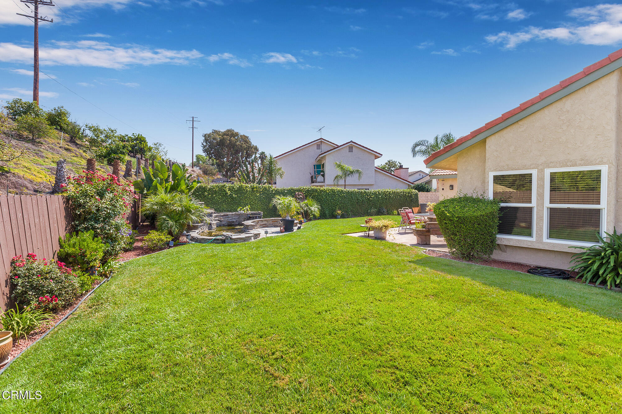 777 Sir George Court Moorpark, CA 93021 - Photo 19 of 22 a front view of a house with a yard and garage