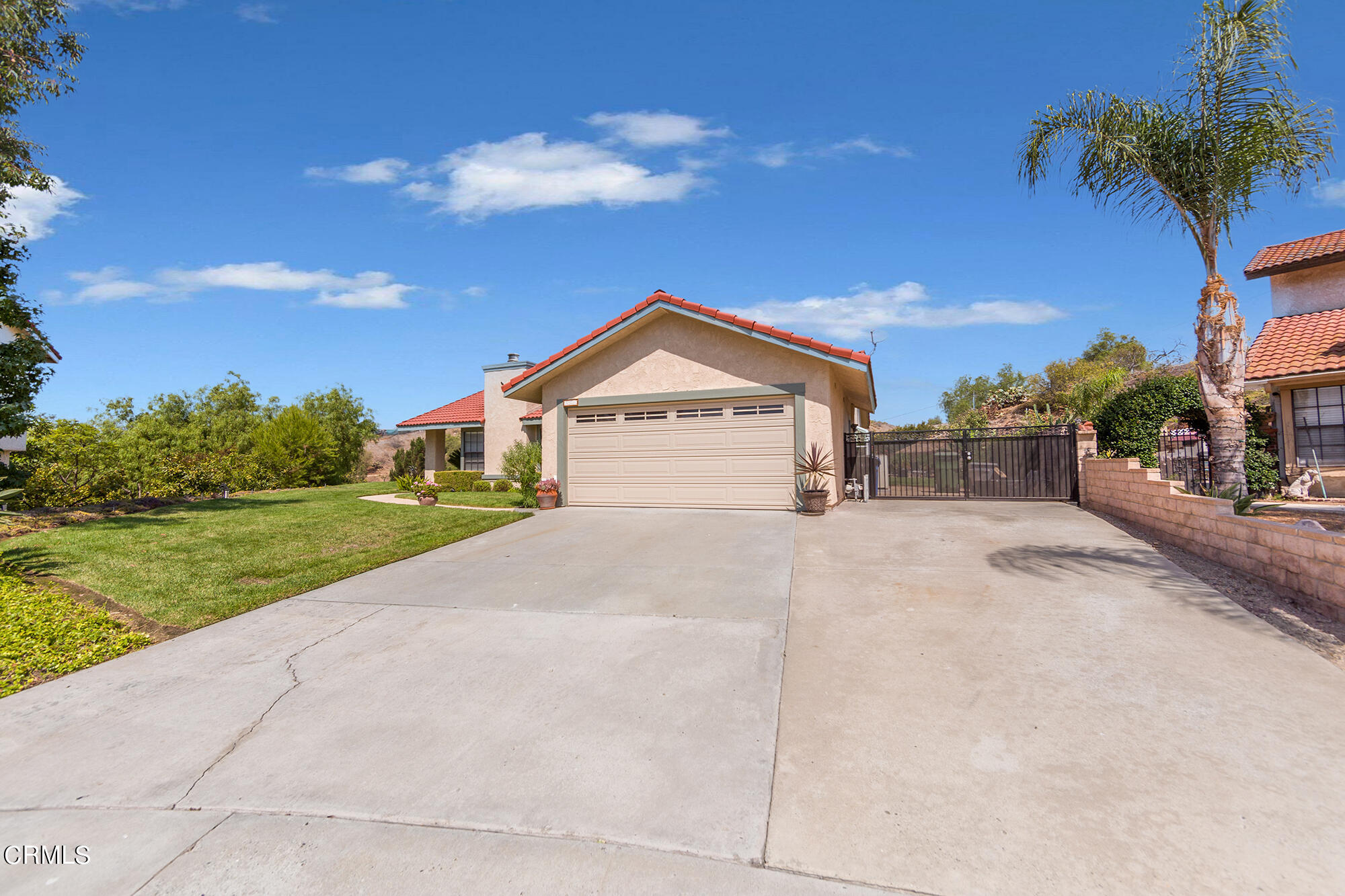 777 Sir George Court Moorpark, CA 93021 - Photo 2 of 22 a view of house with yard and ocean view