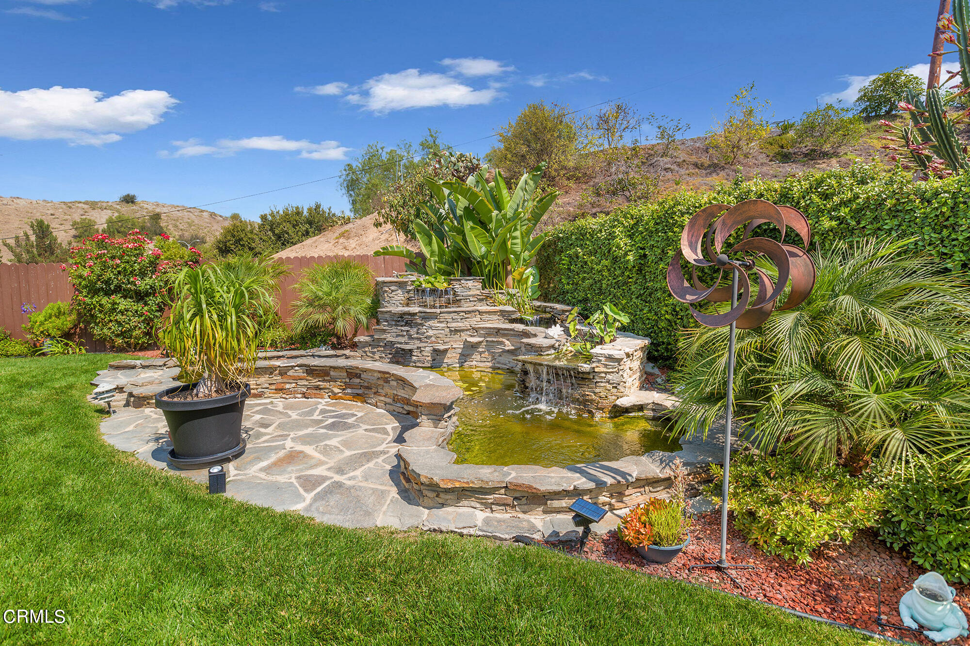 777 Sir George Court Moorpark, CA 93021 - Photo 3 of 22 a view of a swimming pool with a yard