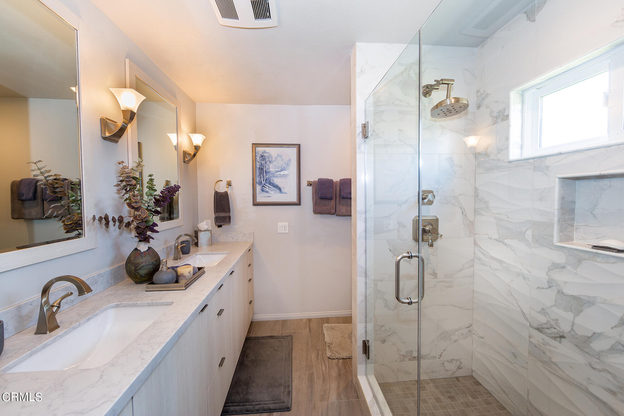 777 Sir George Court Moorpark, CA 93021 - Photo 10 of 22 a bathroom with a double vanity sink mirror and shower