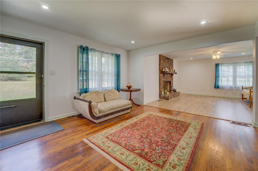 2194 Klondike Road Southwest Conyers, GA 30094 - Photo 2 of 30 a living room with furniture and a rug