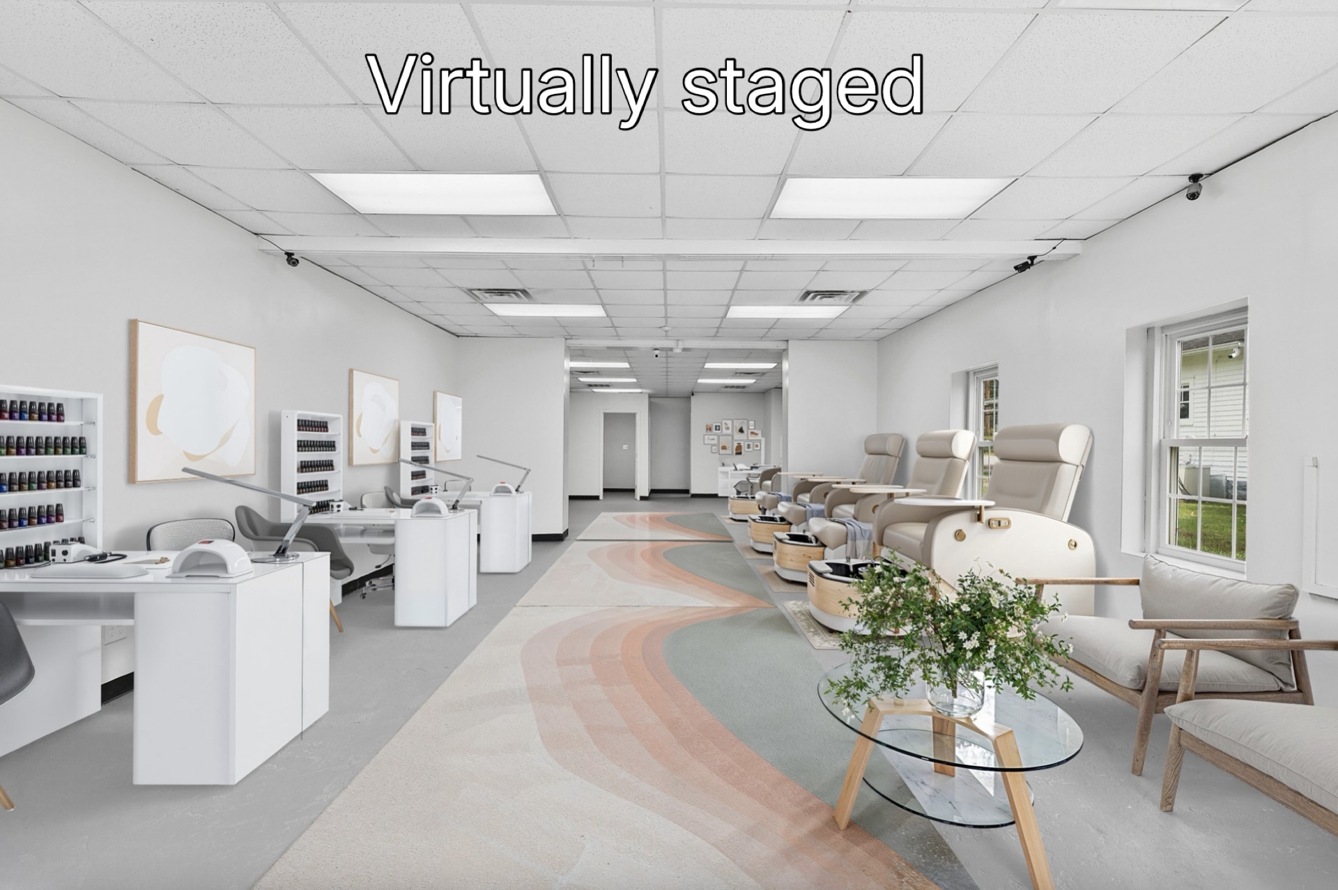 a living room with lots of white furniture and chandelier