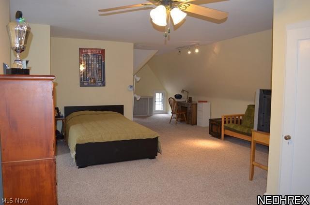3003 Eaton Road Shaker Heights, OH 44122 - Photo 16 of 25 Fantasic 3rd floor bedroom with full bath, carpeting and track lighting.