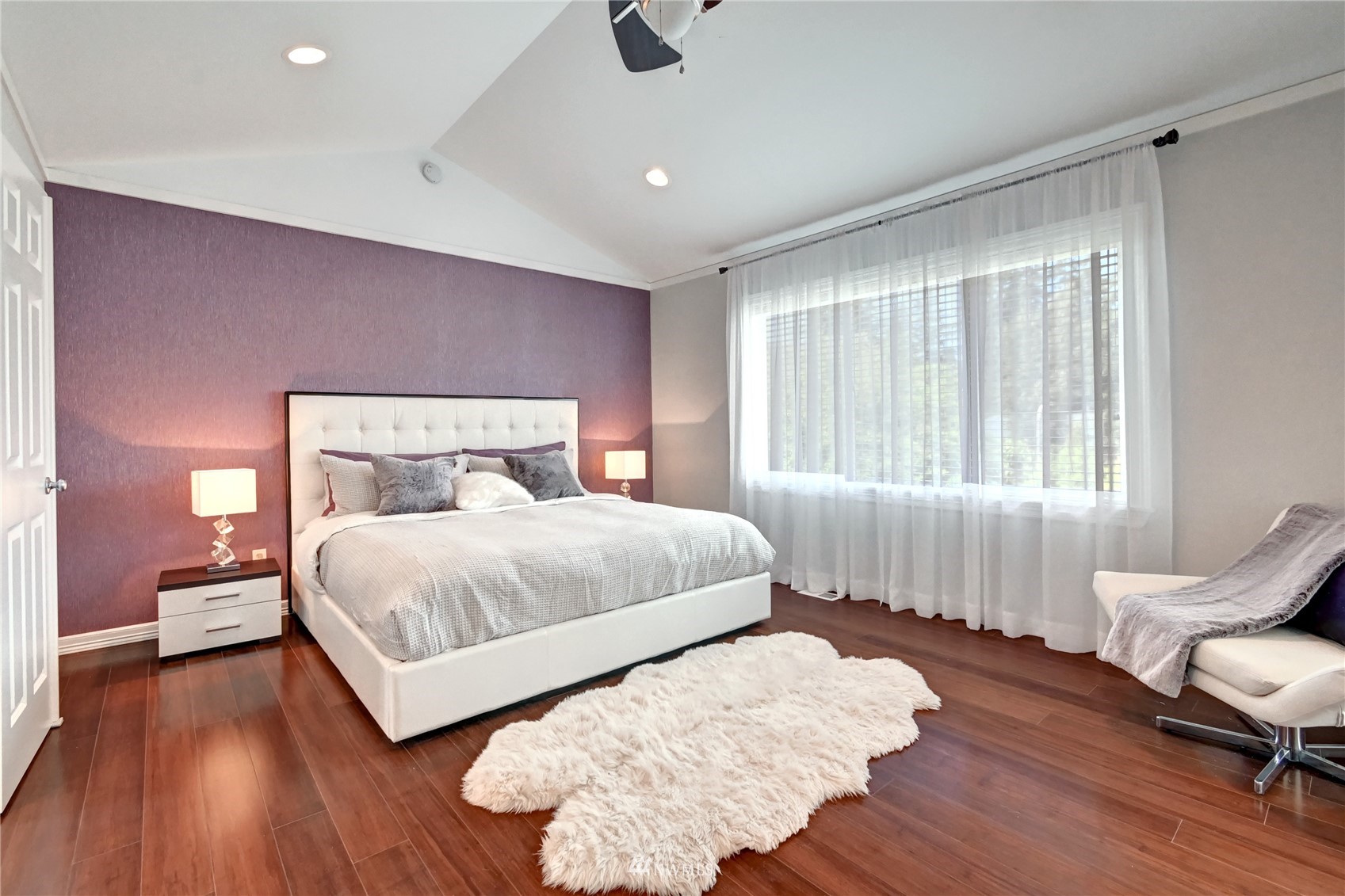 914 Southwest 361st Street Federal Way, WA 98023 - Photo 21 of 40 a bedroom with a bed and wooden floor