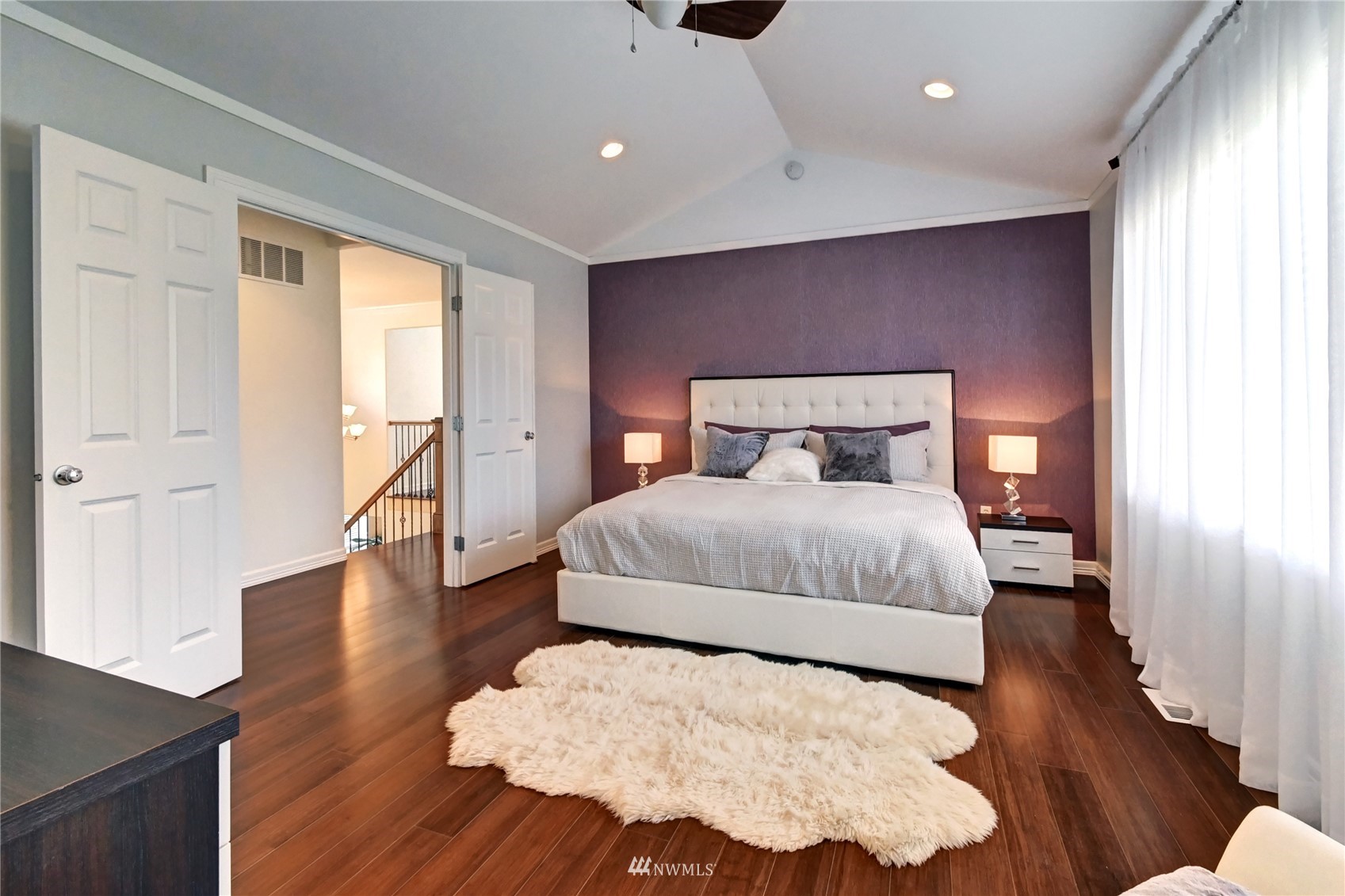 914 Southwest 361st Street Federal Way, WA 98023 - Photo 22 of 40 a bedroom with a bed and wooden floor