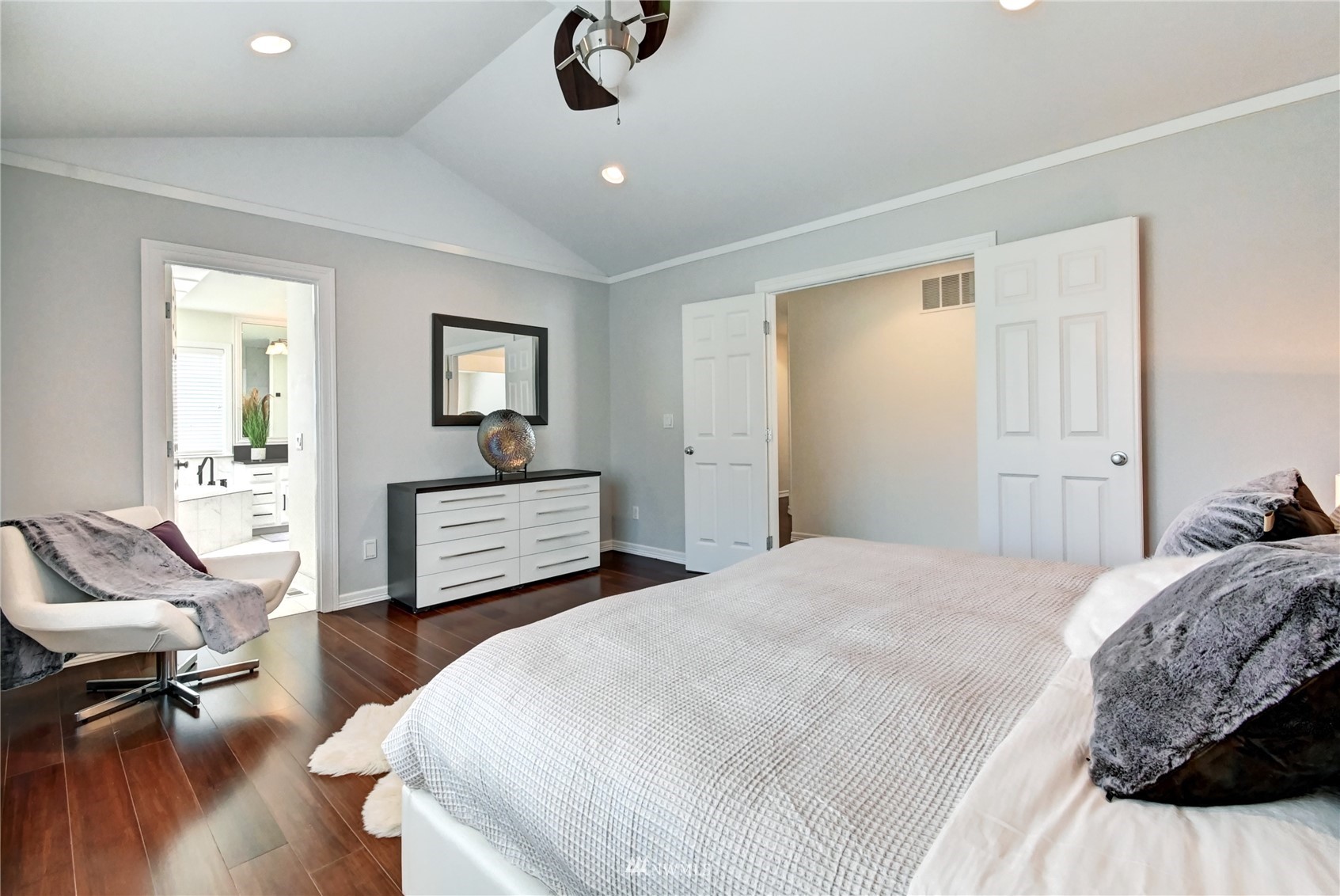 914 Southwest 361st Street Federal Way, WA 98023 - Photo 23 of 40 a bedroom with a bed and wooden floor