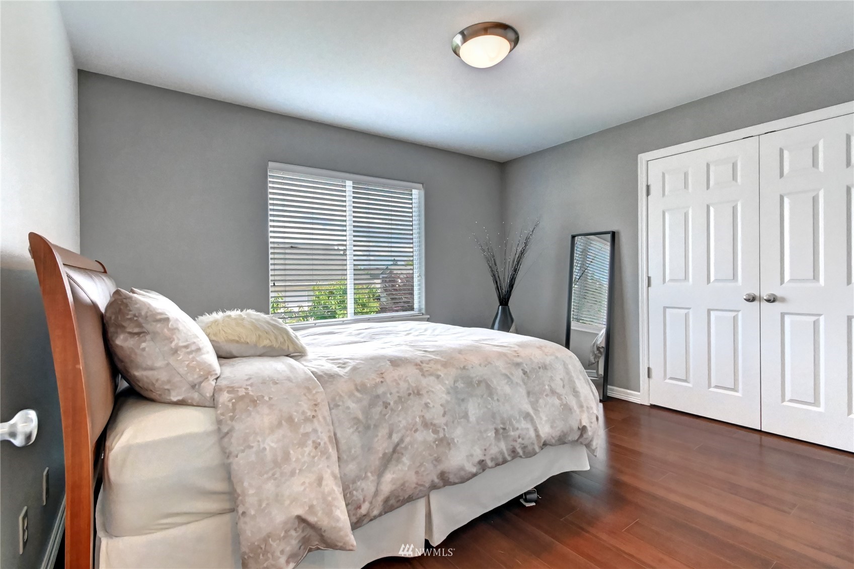 914 Southwest 361st Street Federal Way, WA 98023 - Photo 29 of 40 a bedroom with a bed and wooden floor