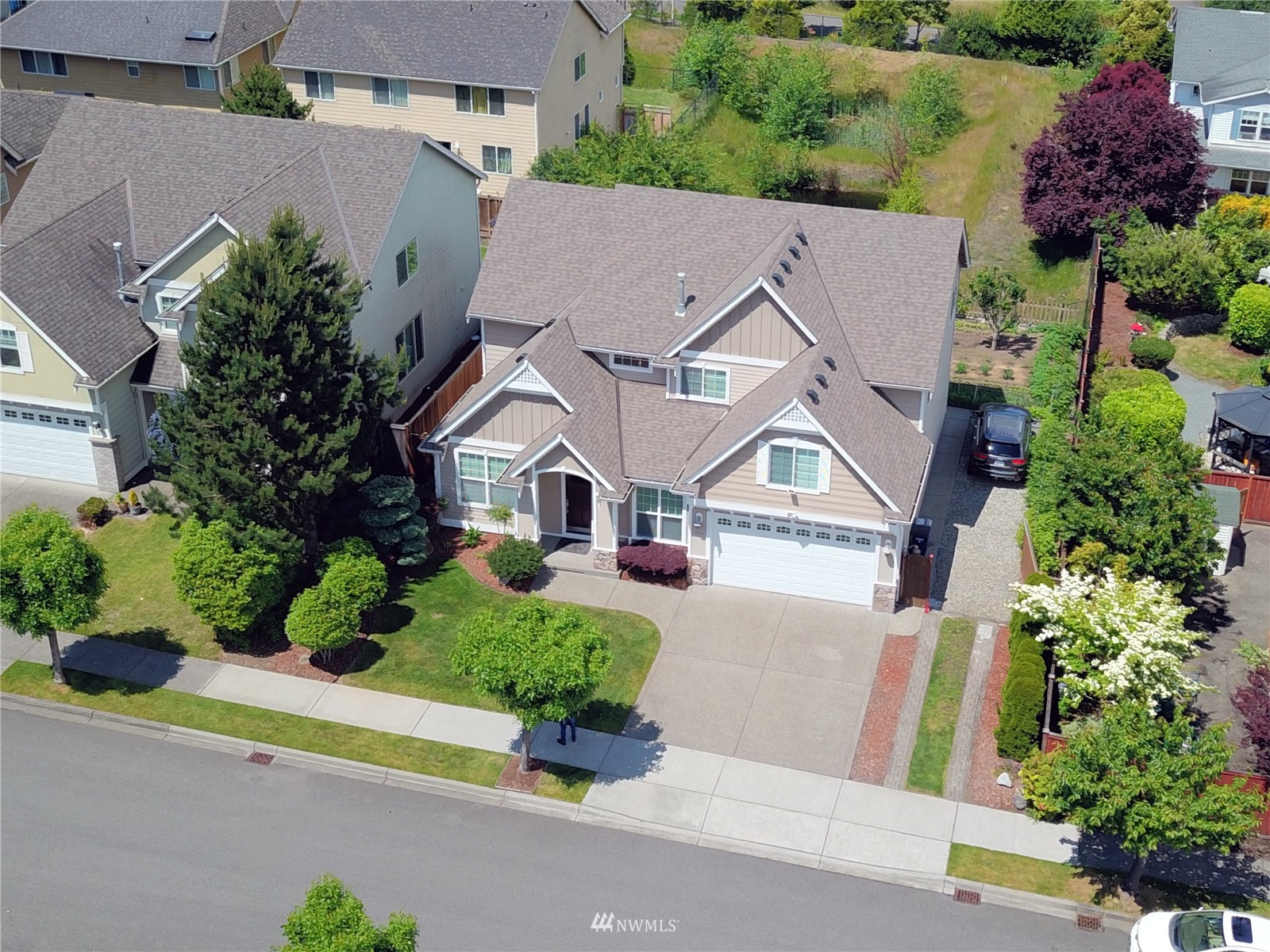 914 Southwest 361st Street Federal Way, WA 98023 - Photo 3 of 40 an aerial view of a house with a yard and a garden