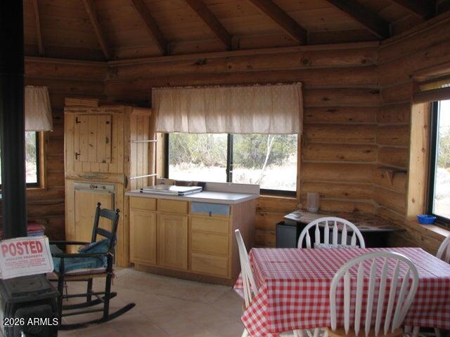 98-99 Chevelon Canyon Ranch, Unit 98 & 99 Heber, AZ 85928 - Photo 8 of 13 a kitchen with a sink a window and chairs