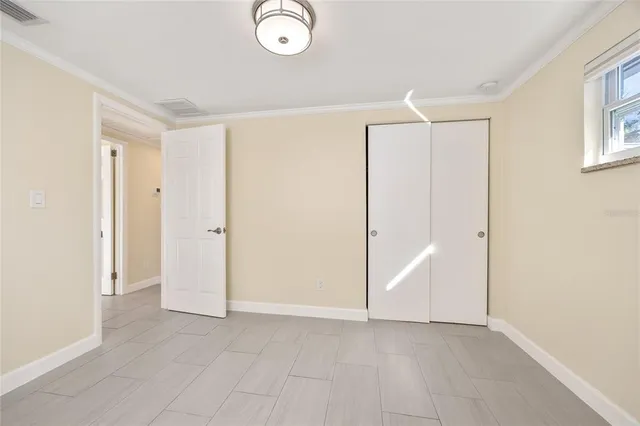 a bathroom with a shower and a mirror