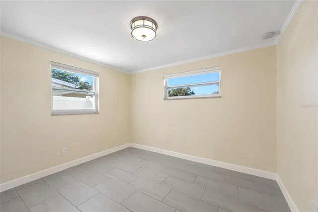 a view of a hallway with washer and dryer