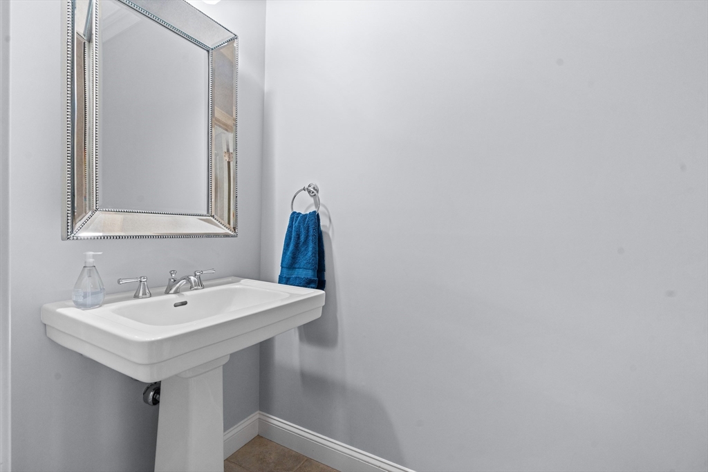 5 Clinton Drive Rehoboth, MA 02769 - Photo 12 of 37 a bathroom with a sink and a mirror