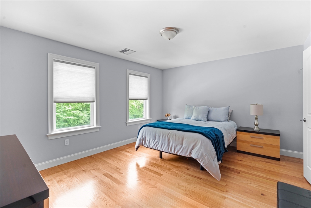 5 Clinton Drive Rehoboth, MA 02769 - Photo 17 of 37 a spacious bedroom with a bed and window