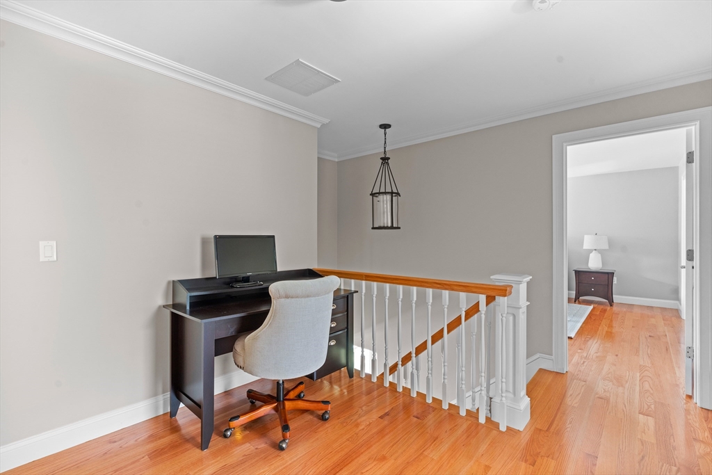 5 Clinton Drive Rehoboth, MA 02769 - Photo 21 of 37 a view of a workspace with furniture and wooden floor
