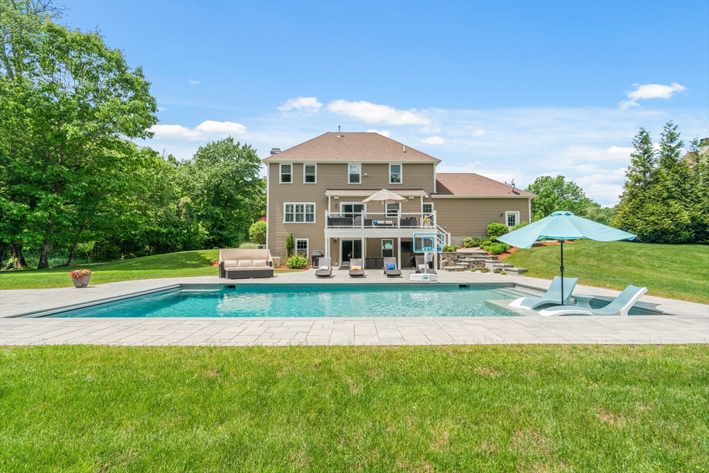 5 Clinton Drive Rehoboth, MA 02769 - Photo 26 of 37 a view of a house with a yard and sitting area
