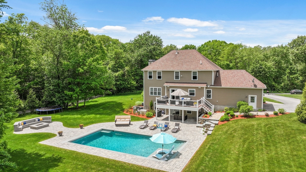 5 Clinton Drive Rehoboth, MA 02769 - Photo 33 of 37 a view of a house with backyard porch and garden