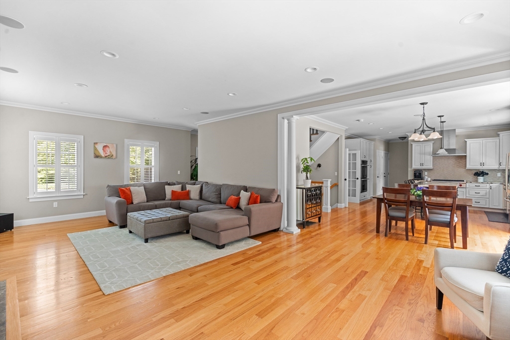 5 Clinton Drive Rehoboth, MA 02769 - Photo 8 of 37 a living room with furniture and a wooden floor