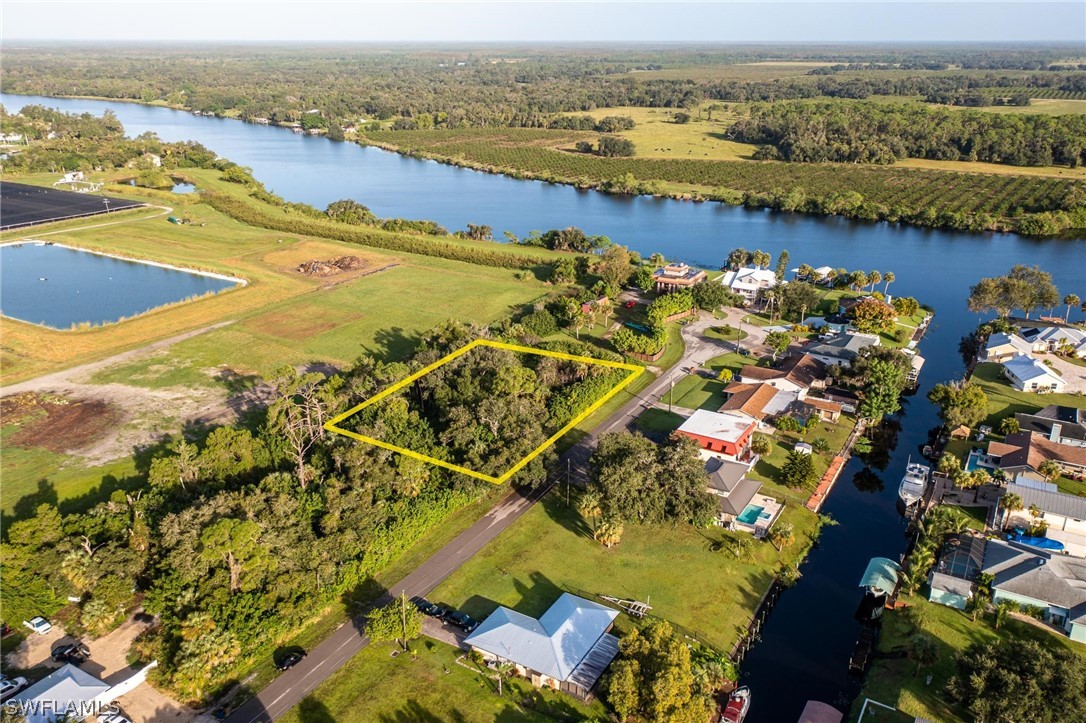 2160 Safe Harbour Court Alva, FL 33920 - Photo 1 of 13 a view of a city with an ocean