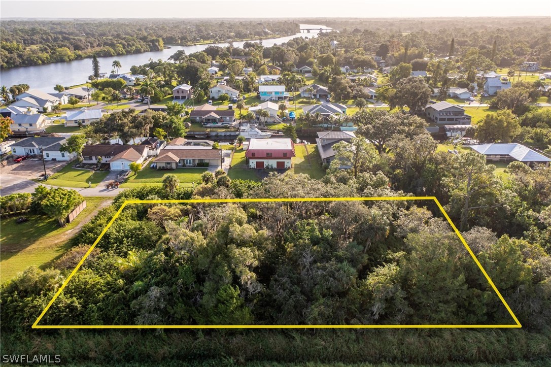 2160 Safe Harbour Court Alva, FL 33920 - Photo 2 of 13 an aerial view of residential houses with outdoor space