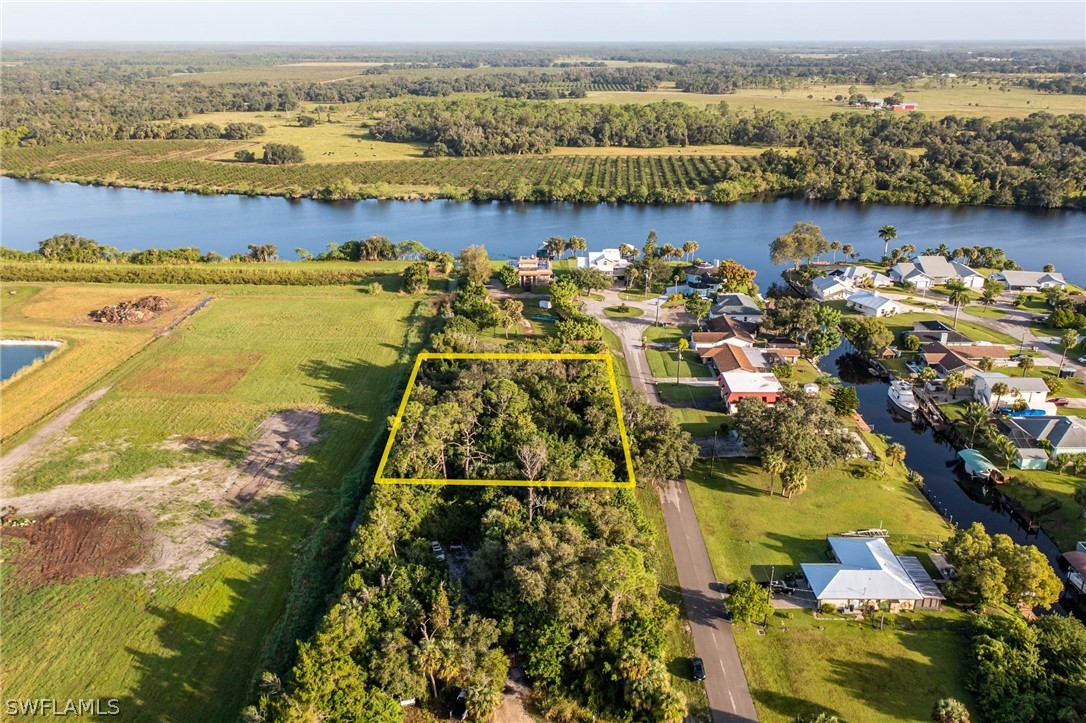 2160 Safe Harbour Court Alva, FL 33920 - Photo 7 of 13 an aerial view of ocean with residential houses with outdoor space