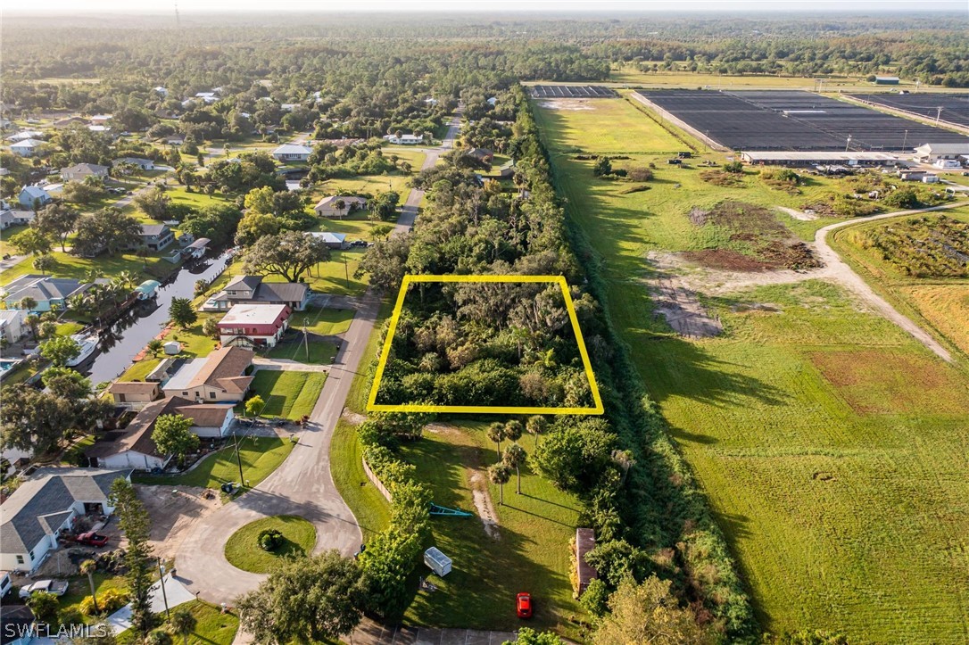 2160 Safe Harbour Court Alva, FL 33920 - Photo 8 of 13 an aerial view of residential houses with outdoor space