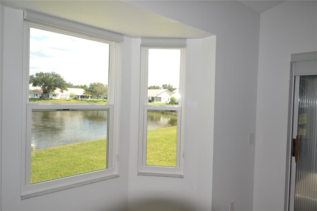 4020 Casa Del Sol Way New Port Richey, FL 34655 - Photo 11 of 98 a view of a room that has a window