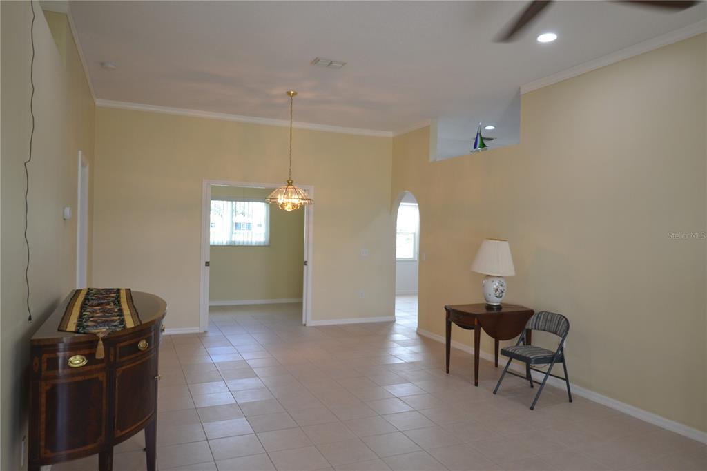 4020 Casa Del Sol Way New Port Richey, FL 34655 - Photo 23 of 98 a view of a workspace with furniture and a window