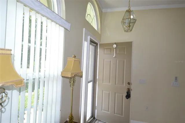 a view of a bathroom from a corridor